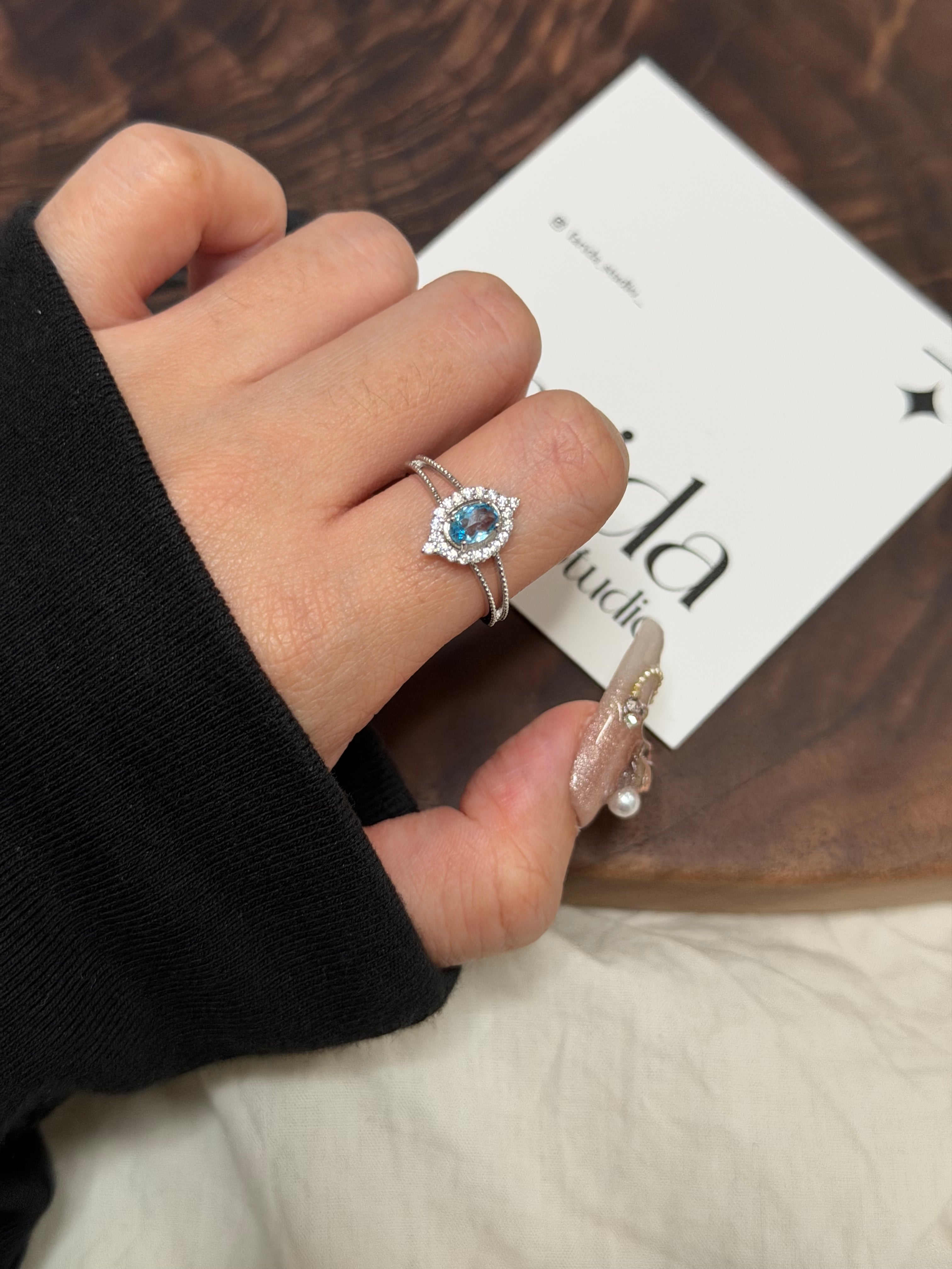 S925鑽鑲馬眼藍托帕戒指