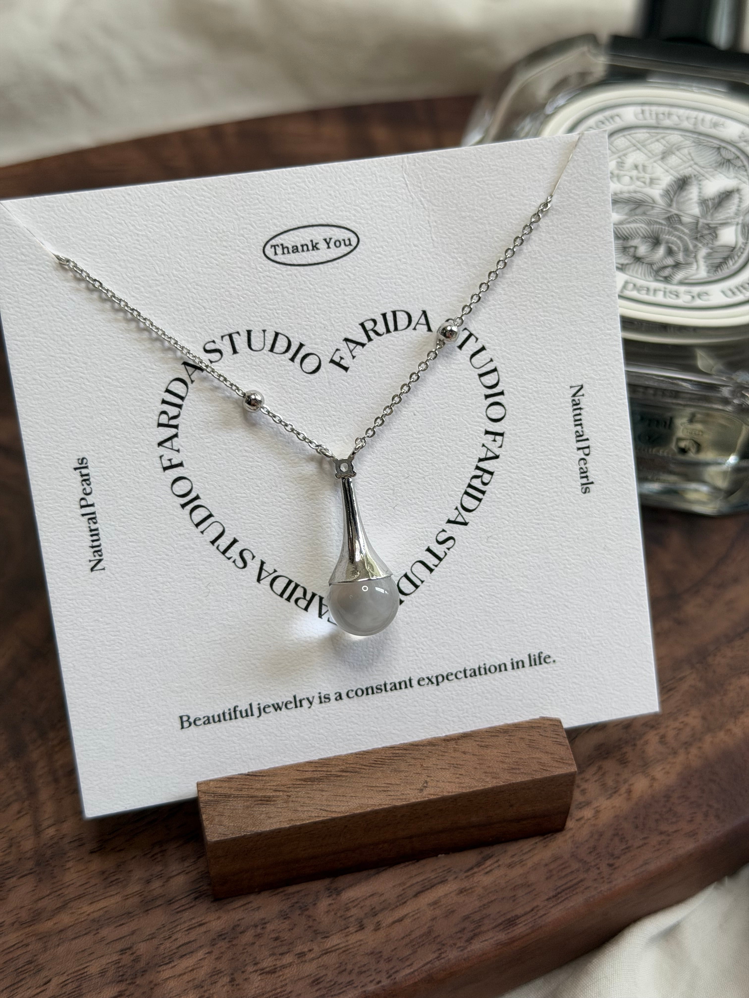 香水瓶白水晶頸鏈